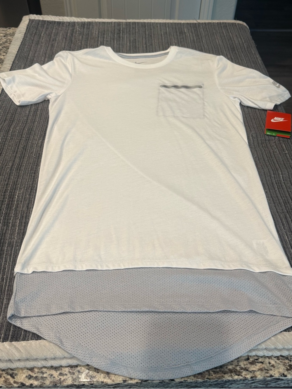Nike reflective pocket t shirt